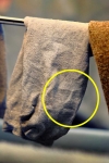 the-face-of-jesus-staring-back-at-her-from-a-crumpled-sock-26338184.jpg